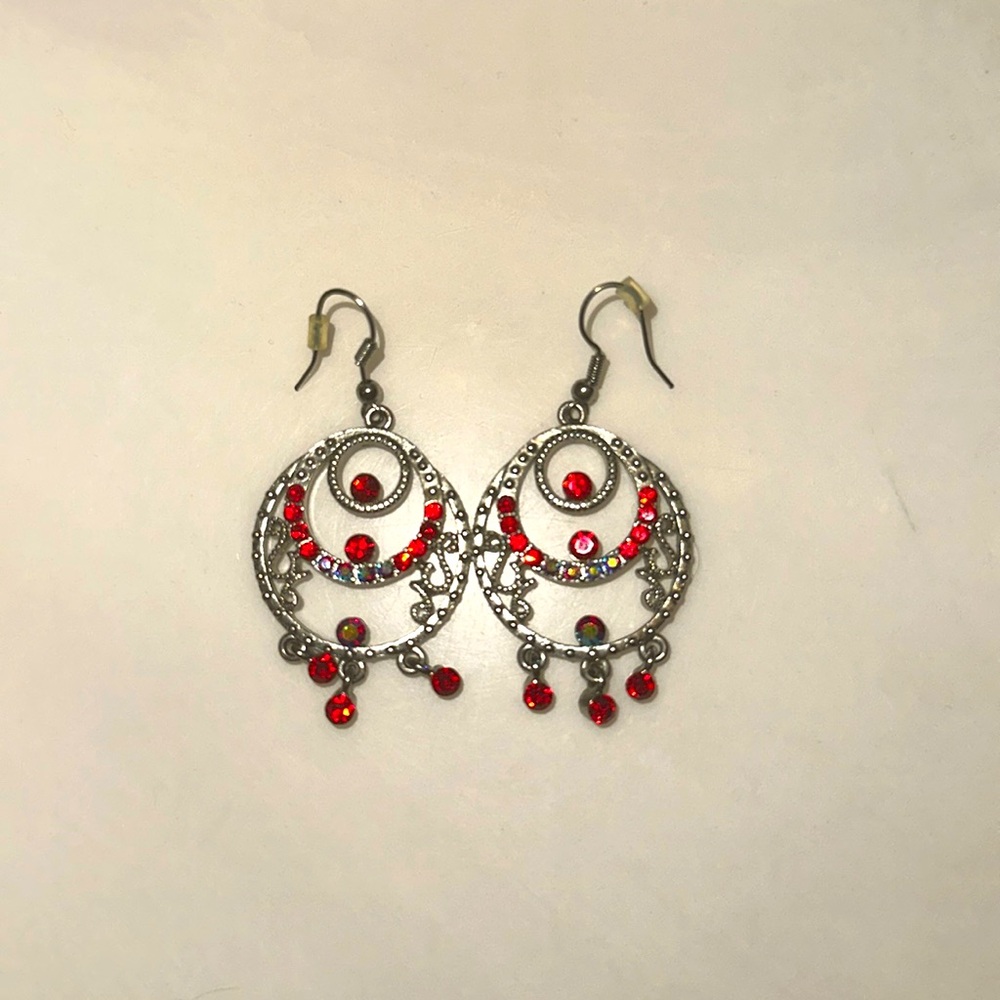 Red jeweled bangle earrings. Very sparkly.